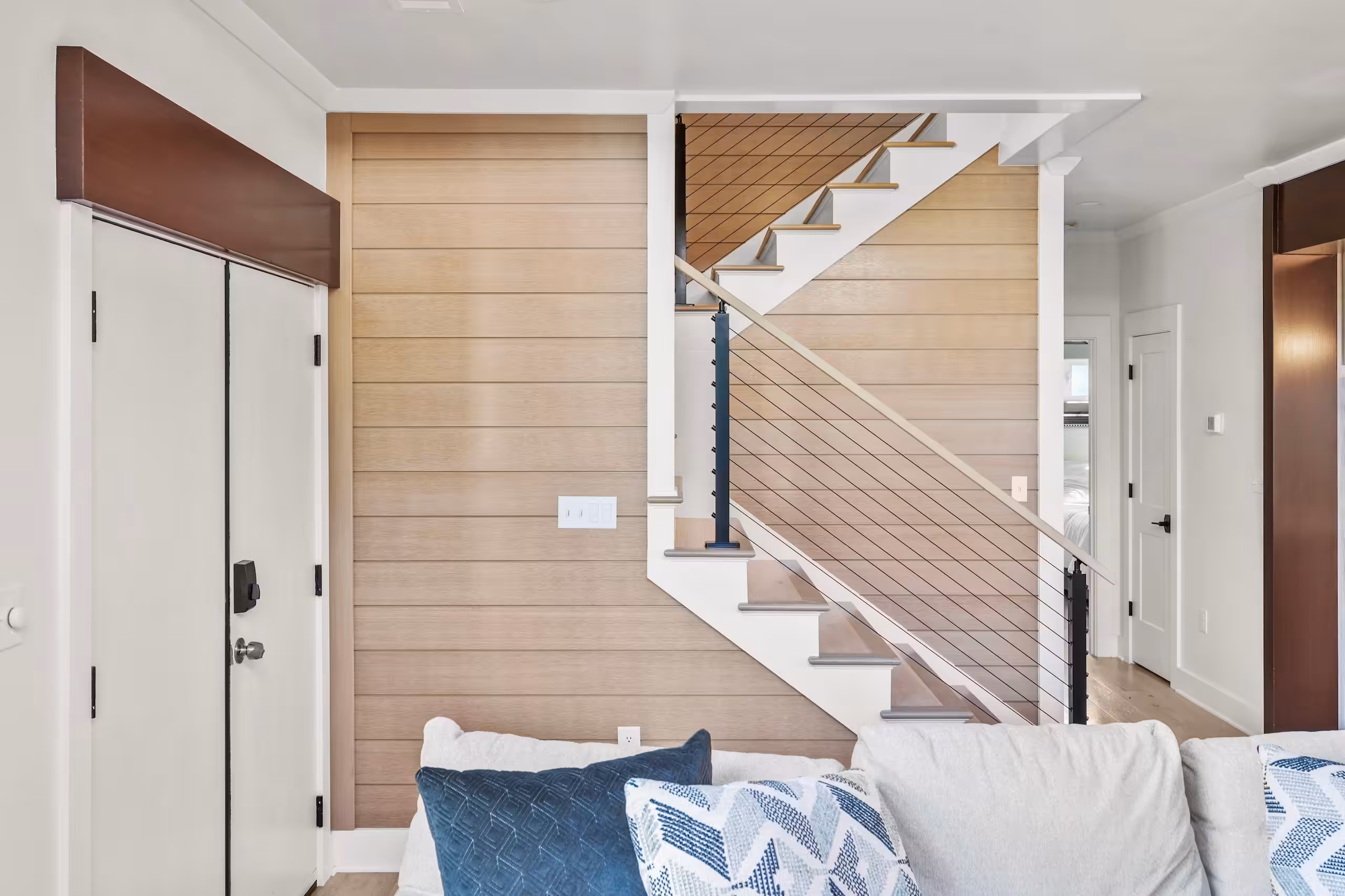 Water-resistant siding material suited for coastal and humid climates