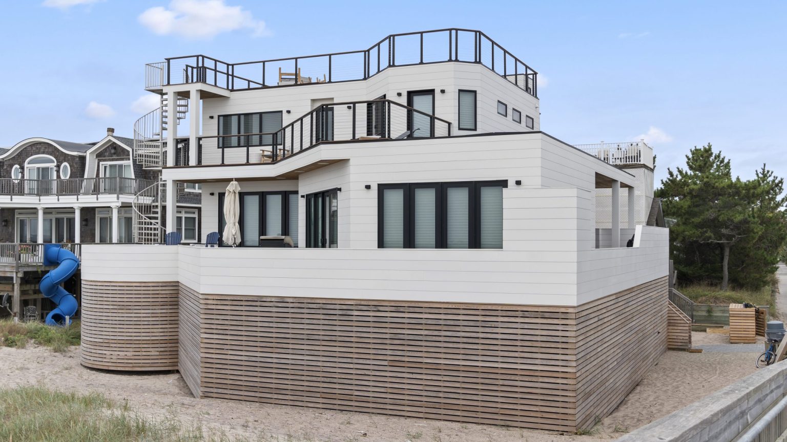Image showcasing Sustainable Building Materials for Coastal Living - Modern Mill