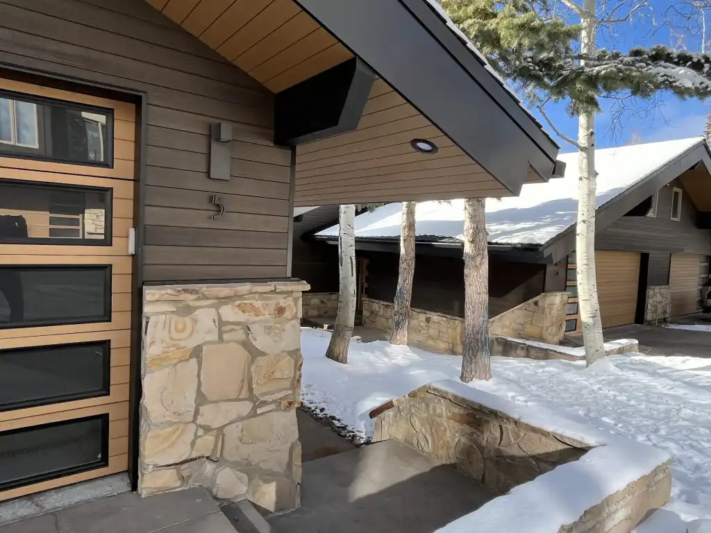 Modern Mill ACRE composite soffit boards on covered entry overhang at Sterlingwood Condominiums, Park City Utah